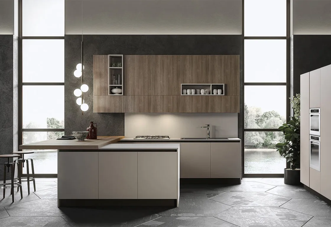 Cucina elegante in legno con penisola bianca a Codogno